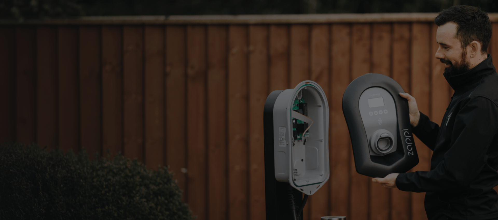 Electrician installing a Zappi EV charger in Kent